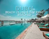 Piscina a sfioro e lettini prendisole in un lussuoso beach club di Dubai, con palme e vista sullo skyline.